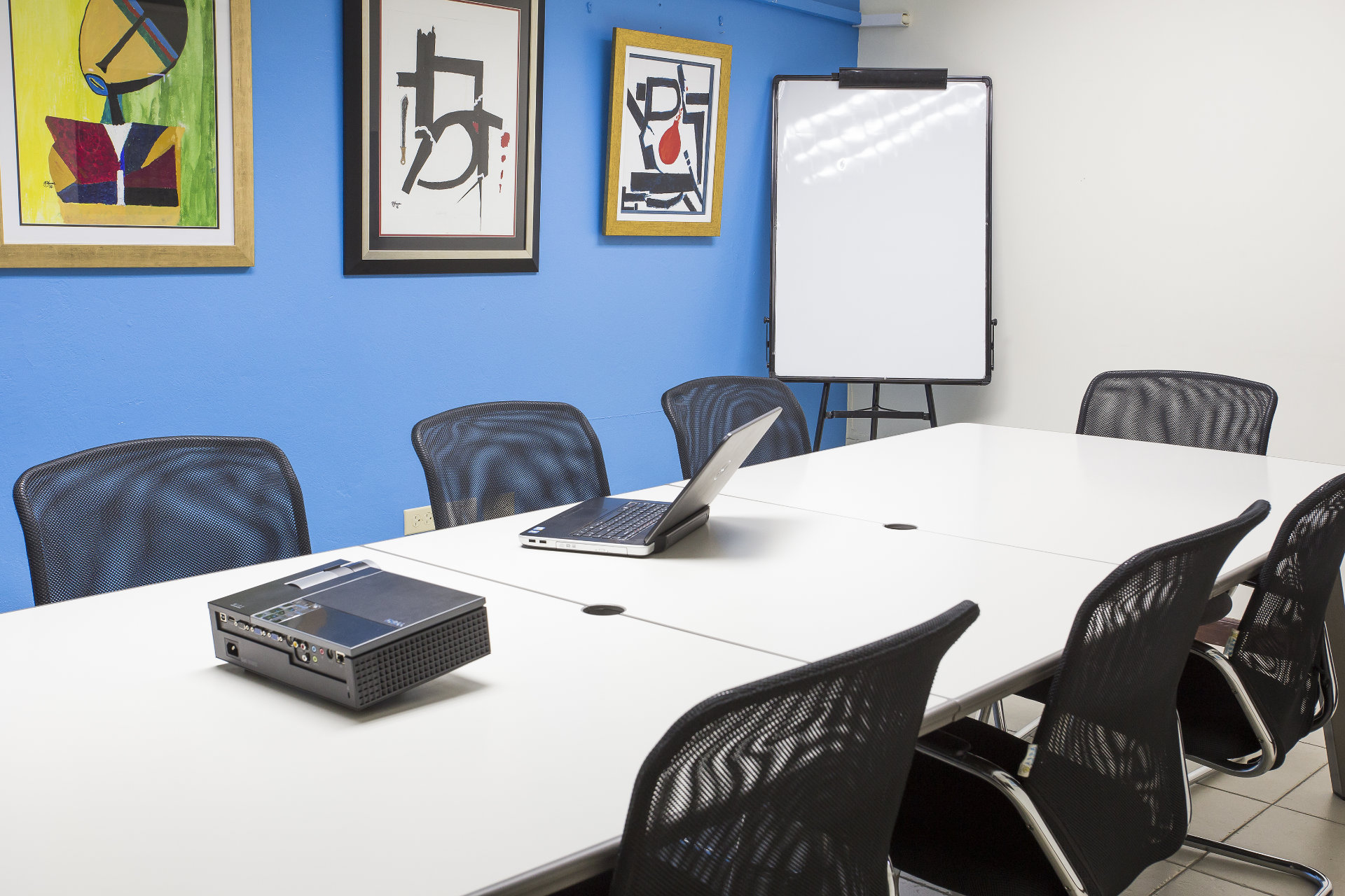 Book an 8 seater Meeting room available hourly or daily at The Business District's Old Hope Road location.